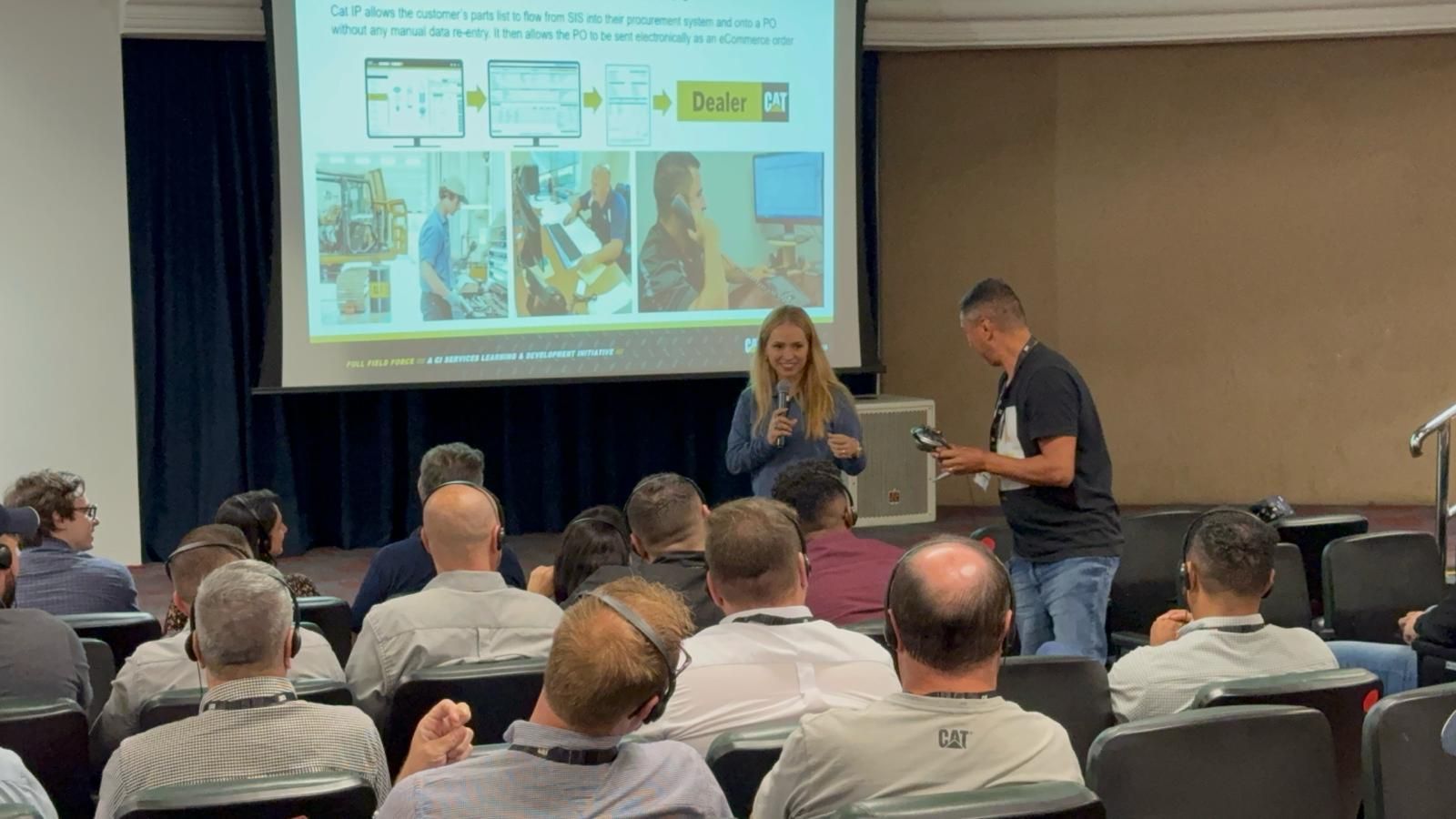 Madeline with a colleague after a Caterpillar workshop